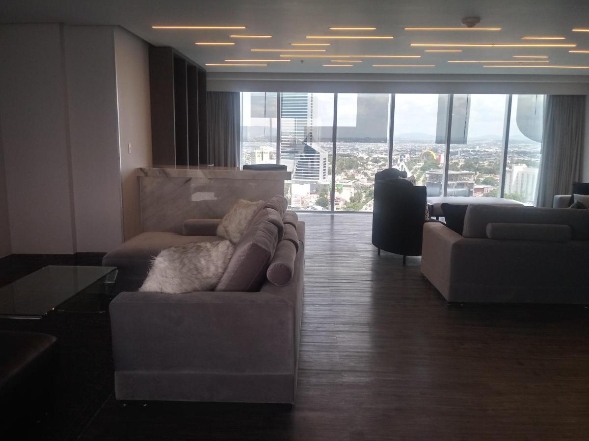 Baruk Guadalajara Hotel De Autor Exterior photo A living room in a penthouse apartment at the Ritz-Carlton, DIFC